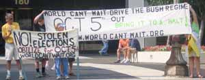 people holding banners about Oct5 and the stolen election